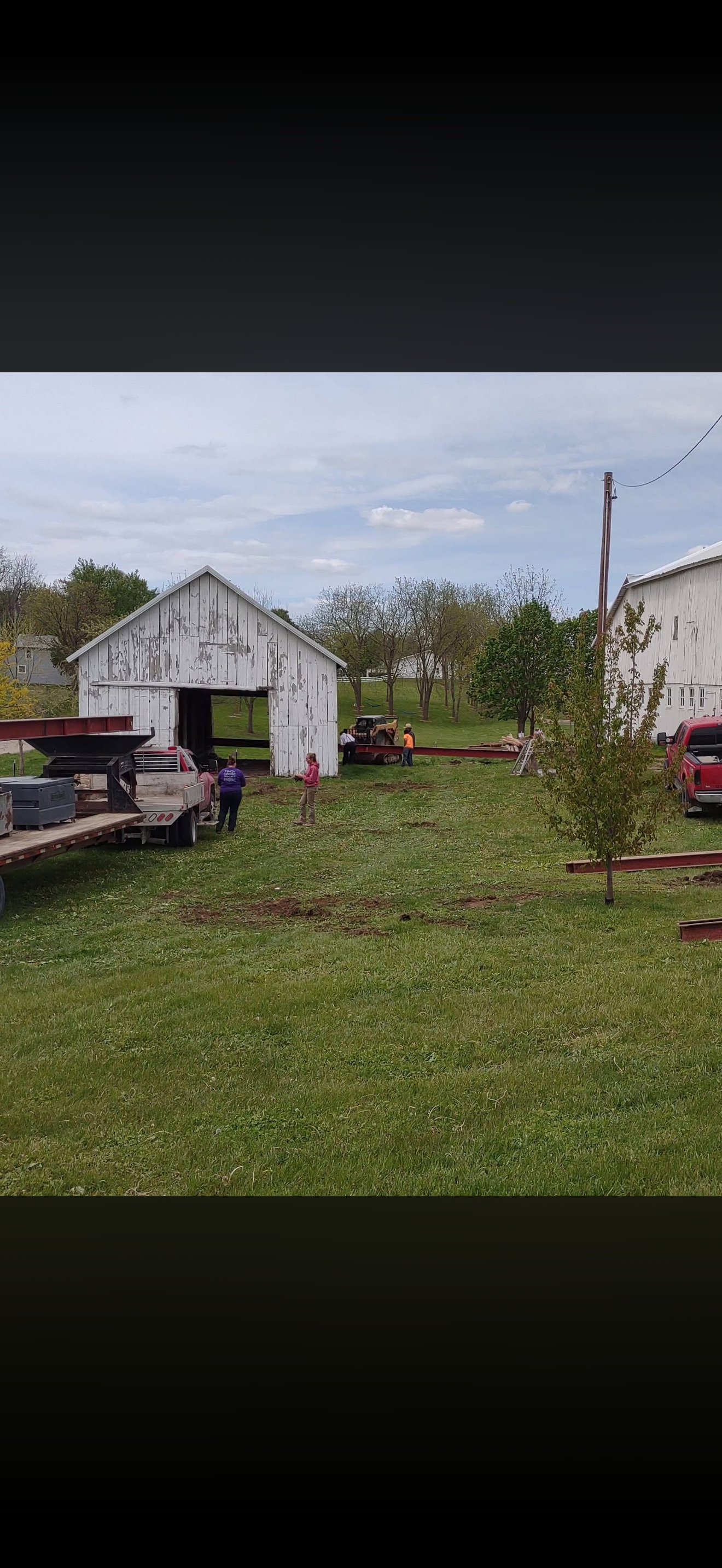 5/5/2026 Meyers Farmstead Historic District corn crib/hog barn starting restoration with lifting the barn to allow for restoration work on the foundation.