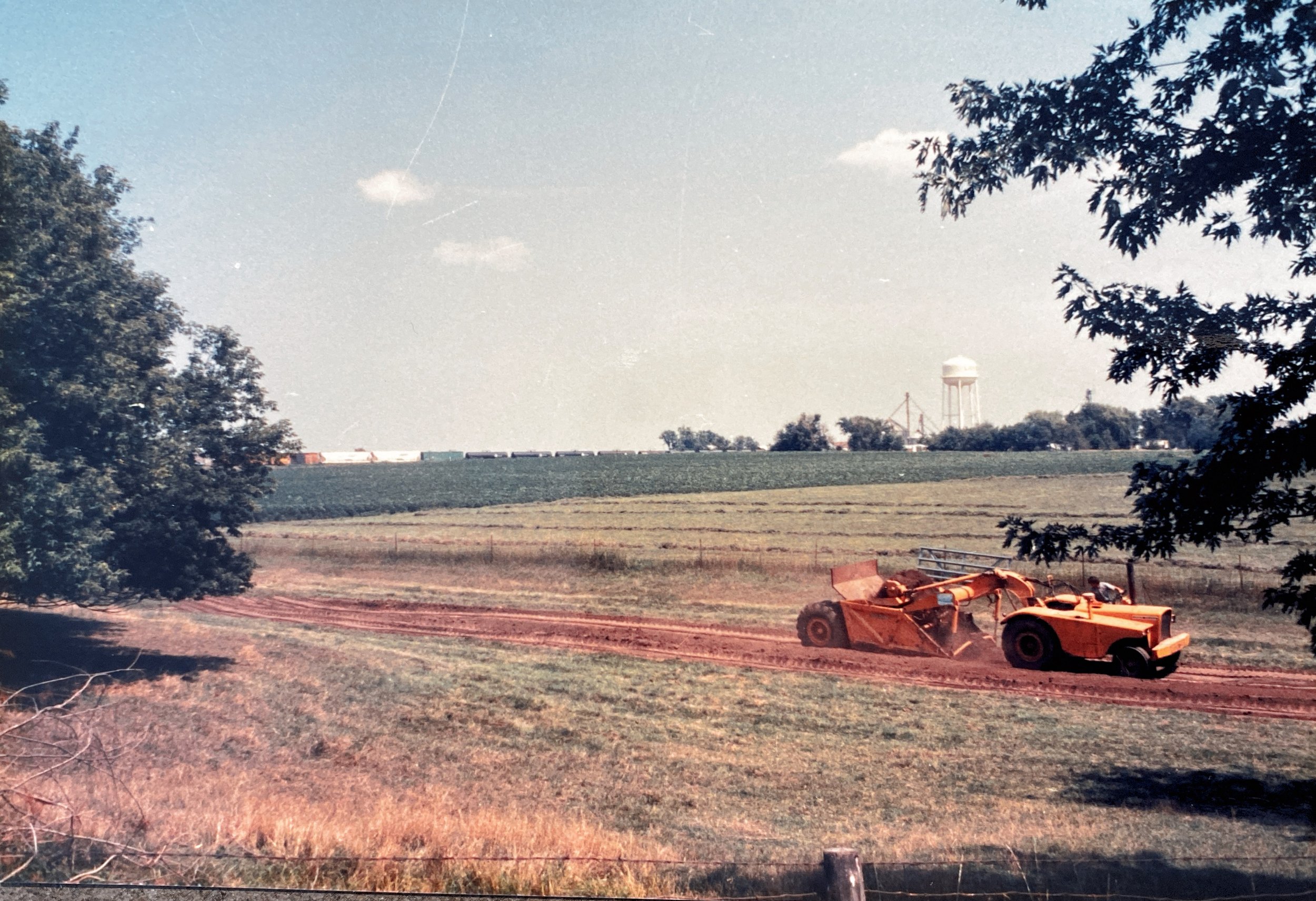 August 8, 1989 - work begins on digging the first pond for the McElmeel family, which would eventually become the Pleasant Grove Heritage Park.