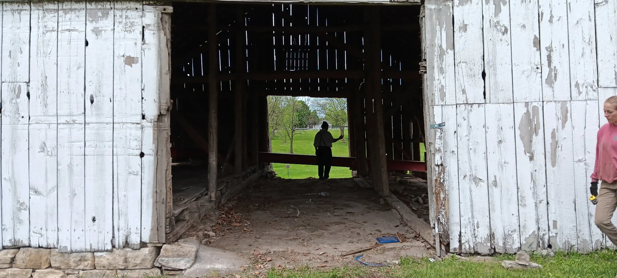 5/5/2026 Meyers Farmstead Historic District corn crib/hog barn starting restoration with lifting the barn to allow for restoration work on the foundation.