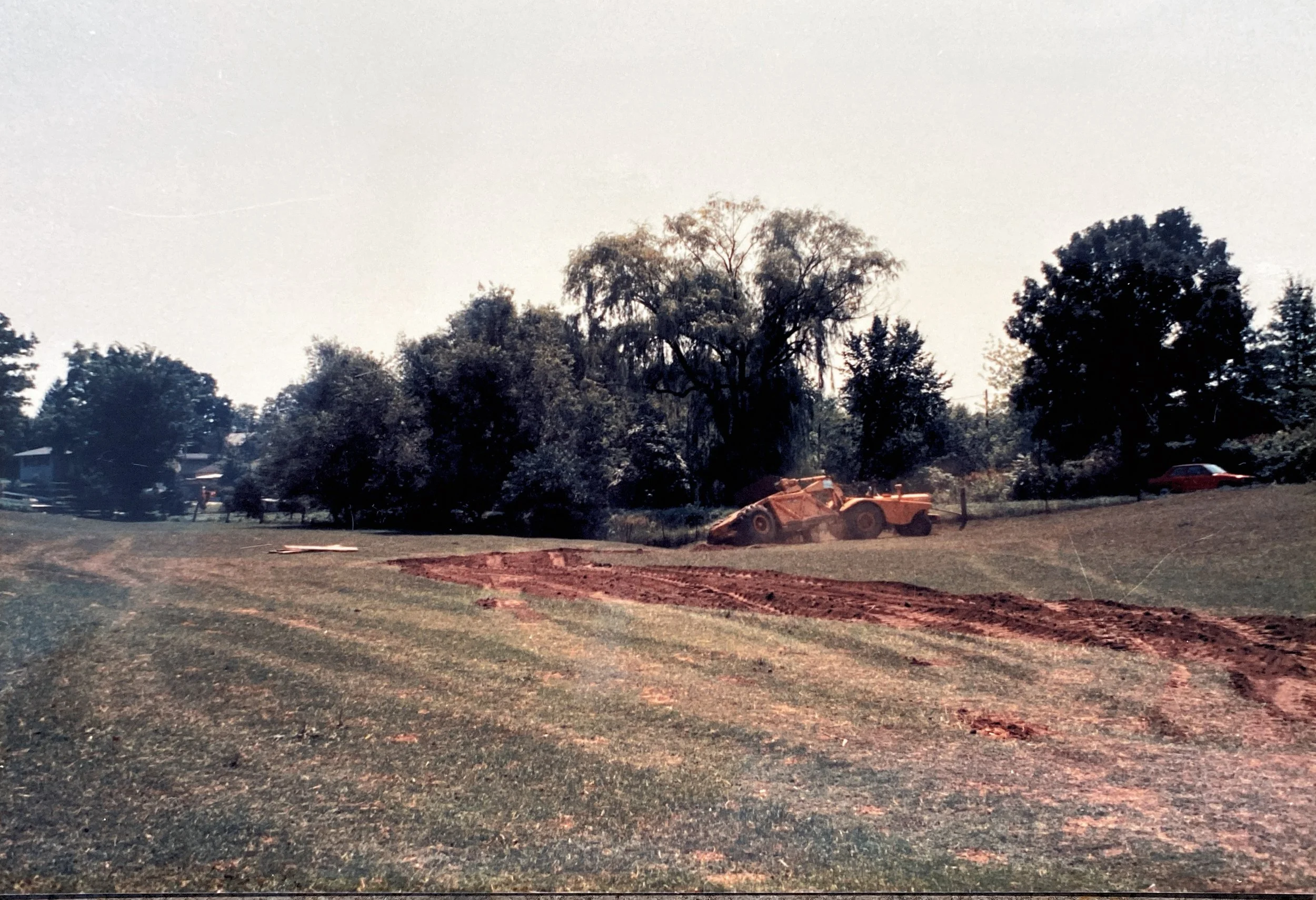 August 10, 1989 - work begins on digging the first pond for the McElmeel family, which would eventually become the Pleasant Grove Heritage Park.