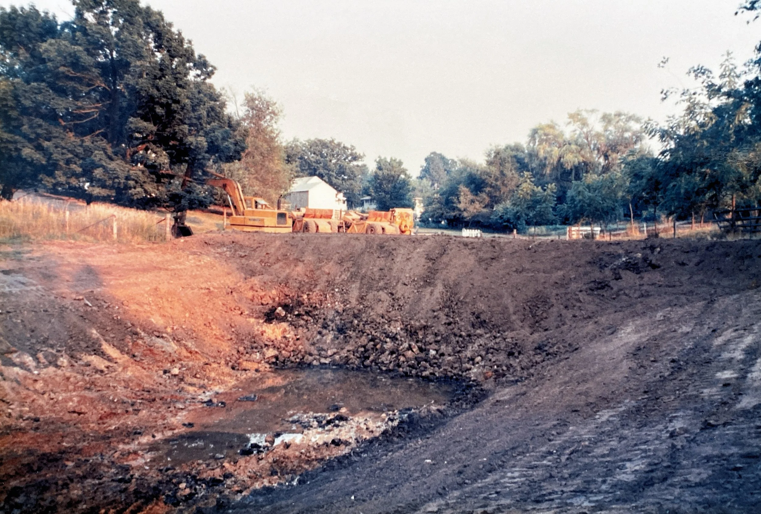 August 12, 1989 - work begins on digging the first pond for the McElmeel family, which would eventually become the Pleasant Grove Heritage Park.