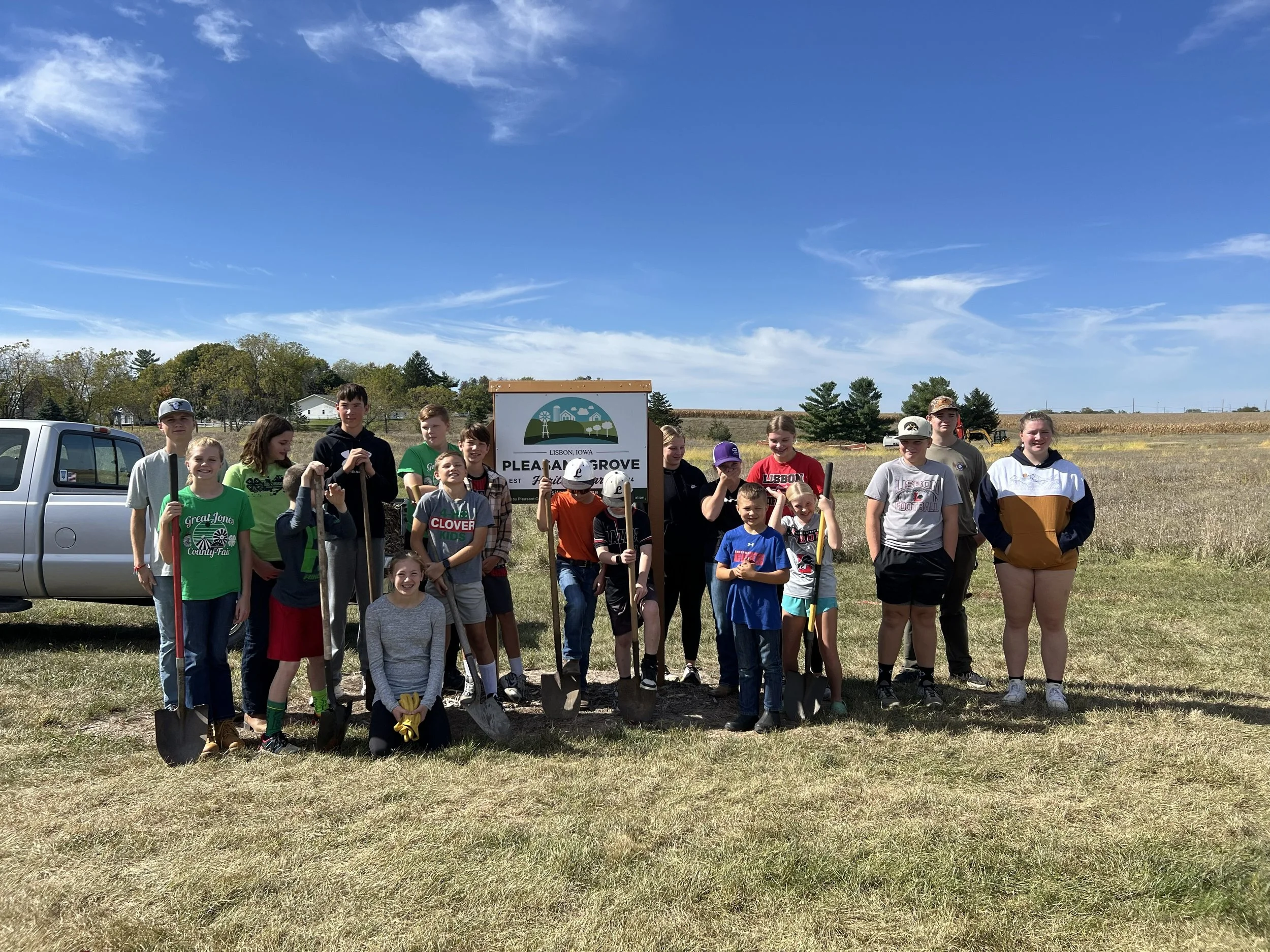 2025-10-11 4-H Group planting trees along the east side of the property
