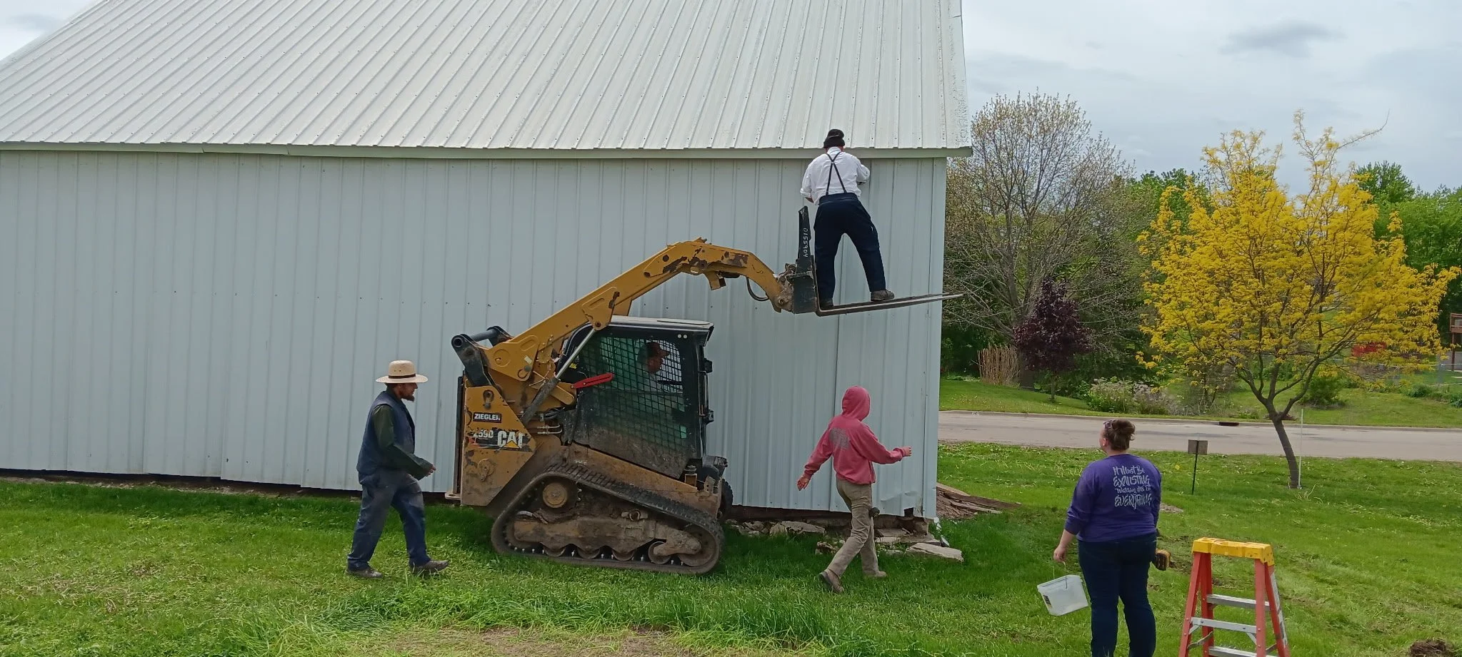 5/5/2026 Meyers Farmstead Historic District corn crib/hog barn starting restoration with lifting the barn to allow for restoration work on the foundation.