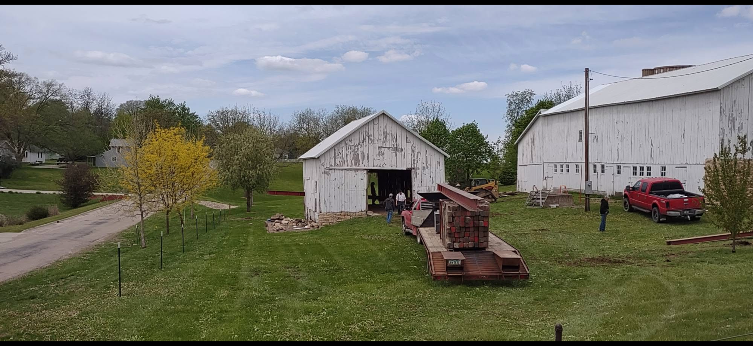 5/5/2026 Meyers Farmstead Historic District corn crib/hog barn starting restoration with lifting the barn to allow for restoration work on the foundation.