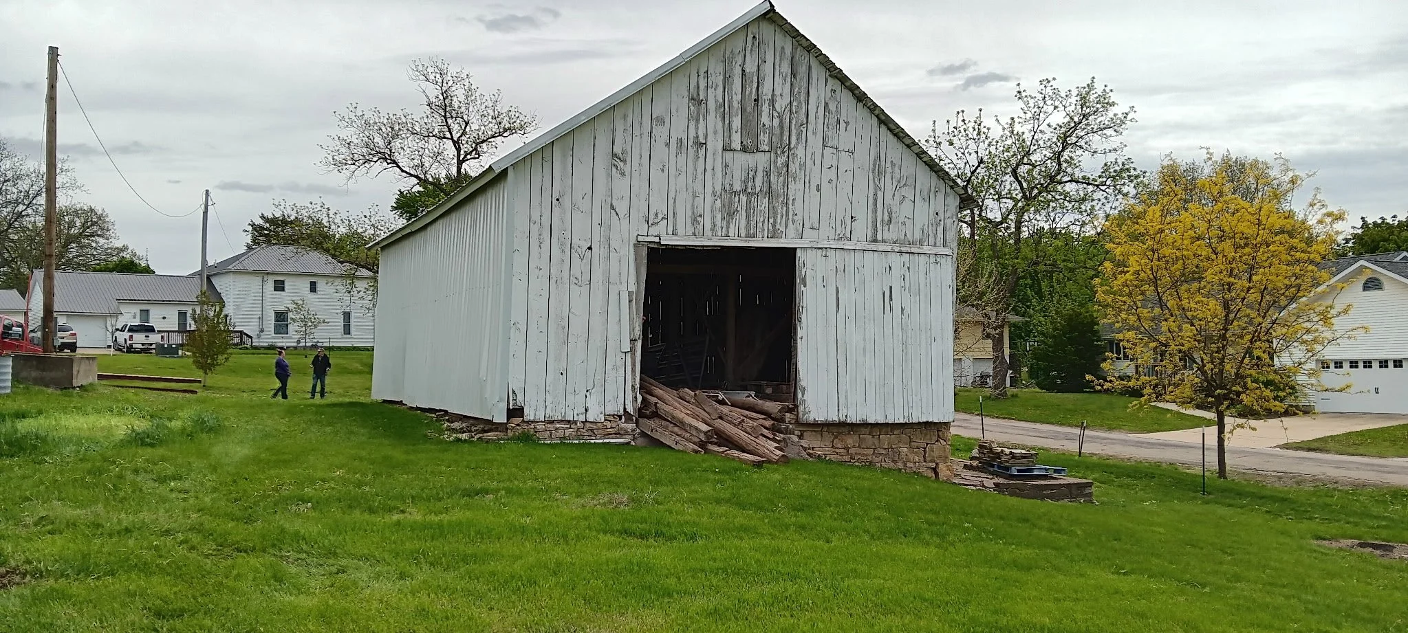 5/5/2026 Meyers Farmstead Historic District corn crib/hog barn starting restoration with lifting the barn to allow for restoration work on the foundation.