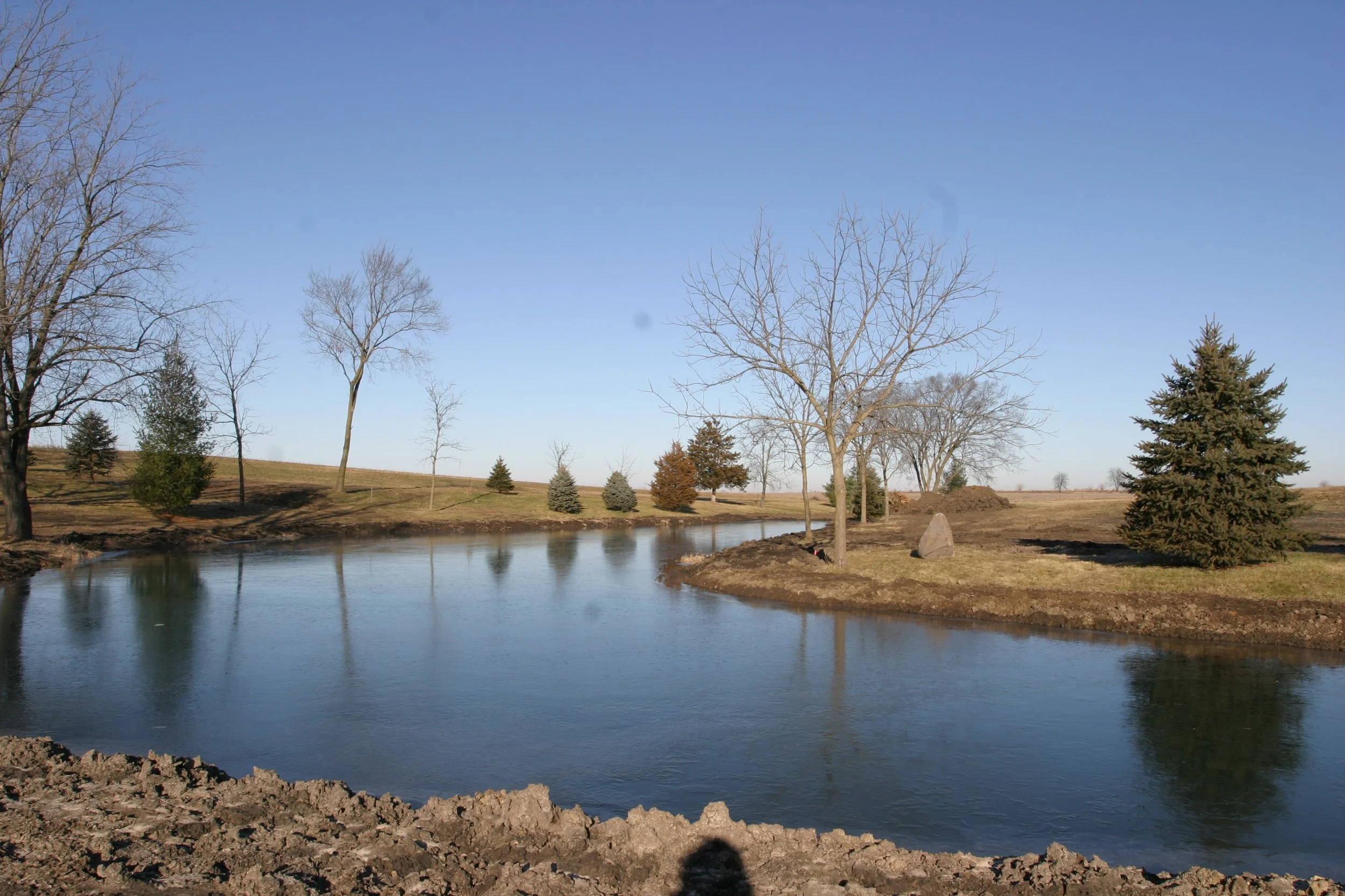 Pond number two showing the recently placed boulder.