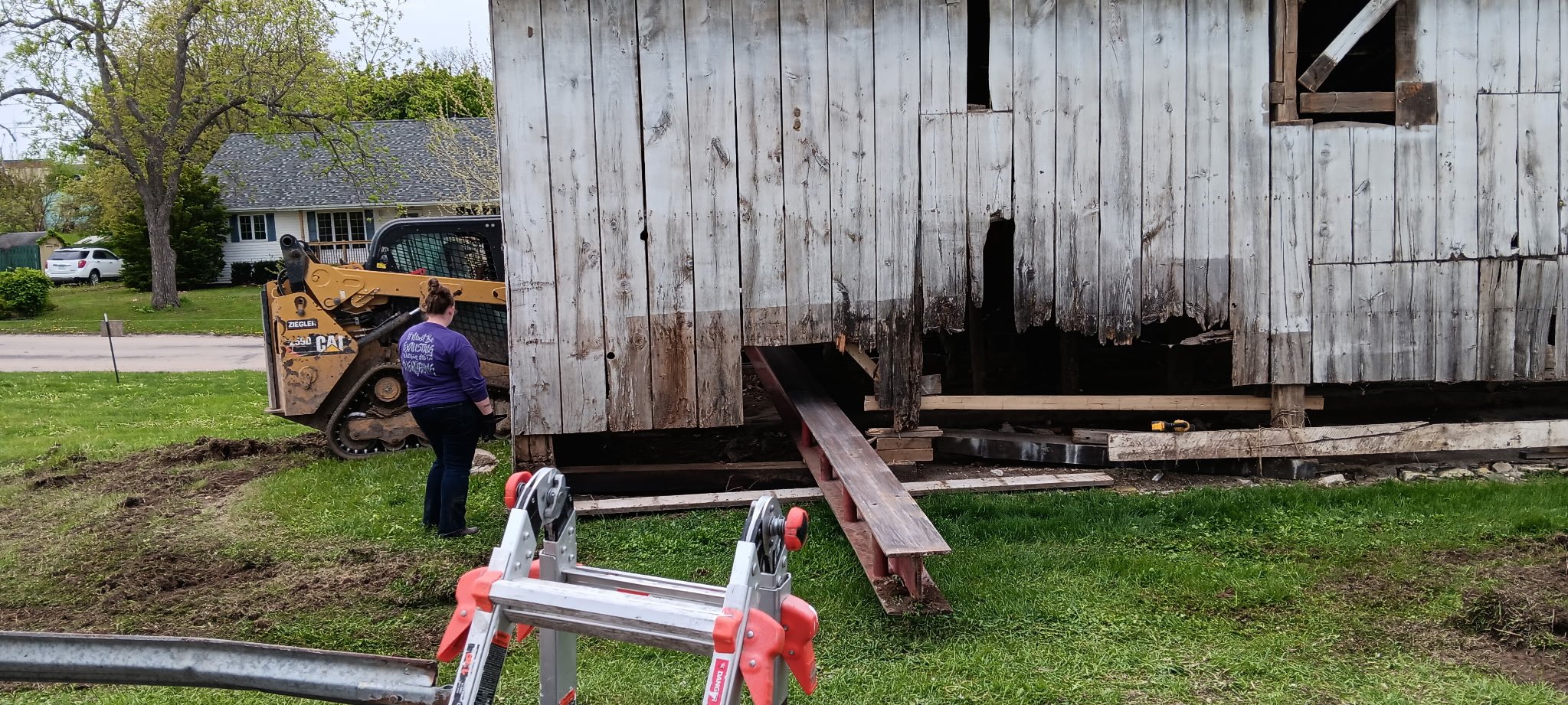 5/5/2026 Meyers Farmstead Historic District corn crib/hog barn starting restoration with lifting the barn to allow for restoration work on the foundation.
