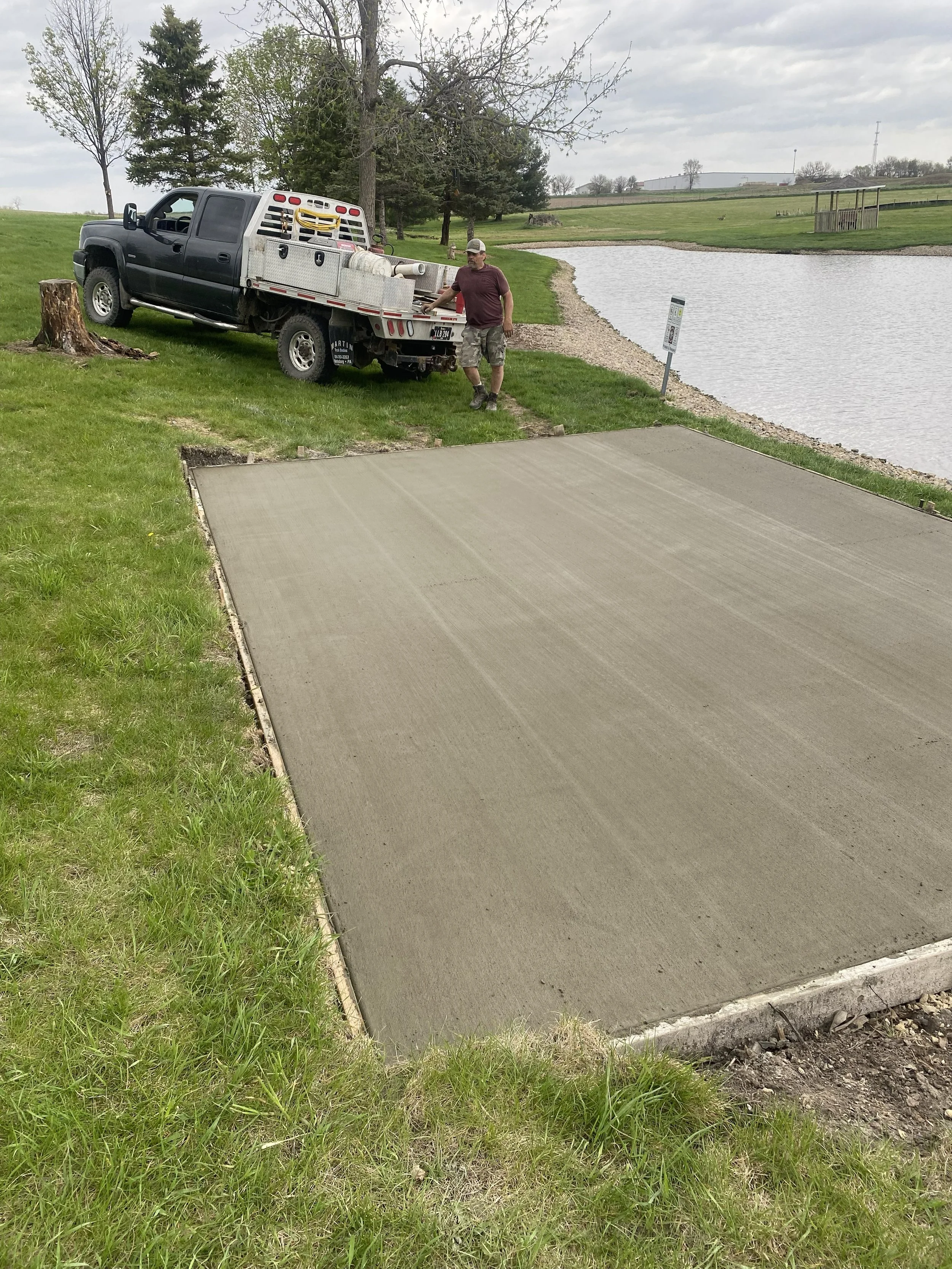 2026-4-23 Greg Butteris pouring concrete pad for pavilion in Pleasant Grove Heritage Park