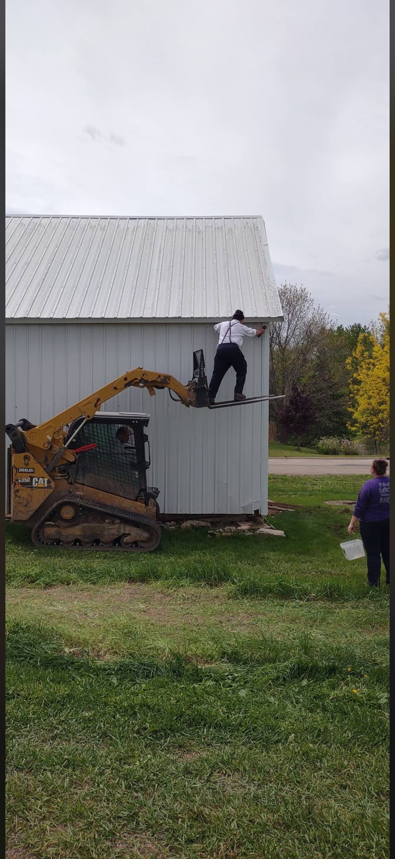 5/5/2026 Meyers Farmstead Historic District corn crib/hog barn starting restoration with lifting the barn to allow for restoration work on the foundation.