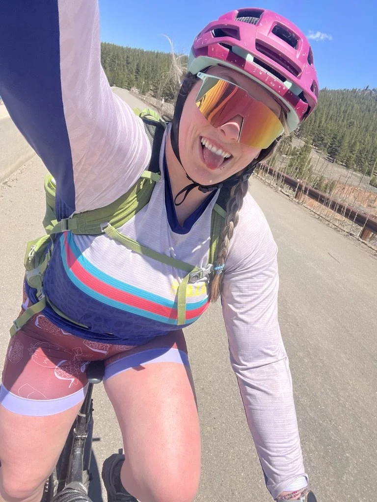 selfie sticking tongue out riding bike
