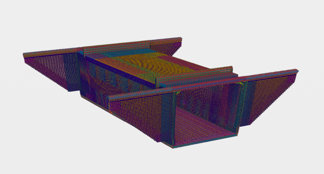 3D wireframe model of a building or structure with walls, floors, and roof, rendered in multicolor lines on a plain background.