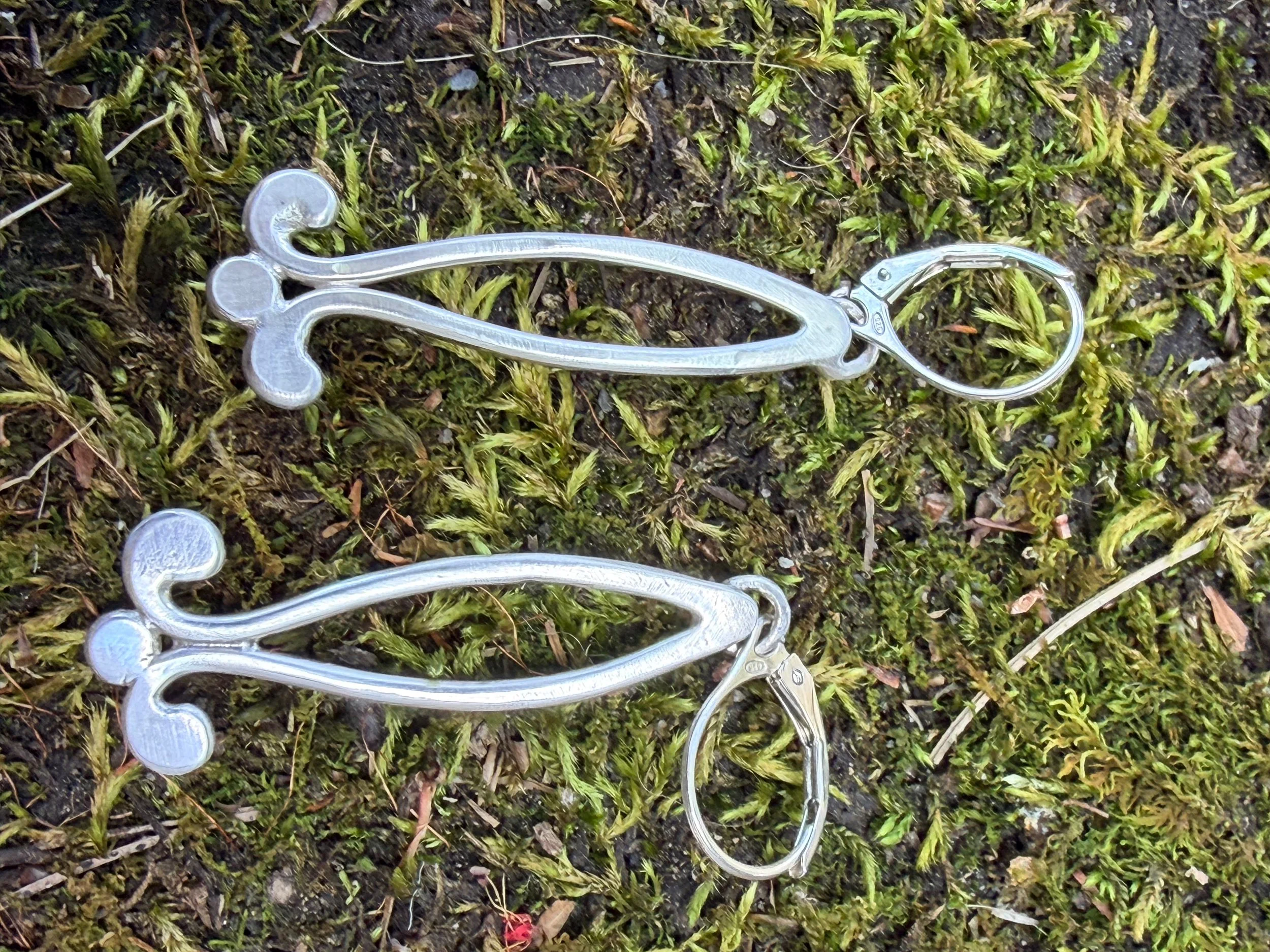 Sterling silver flower peddle earrings