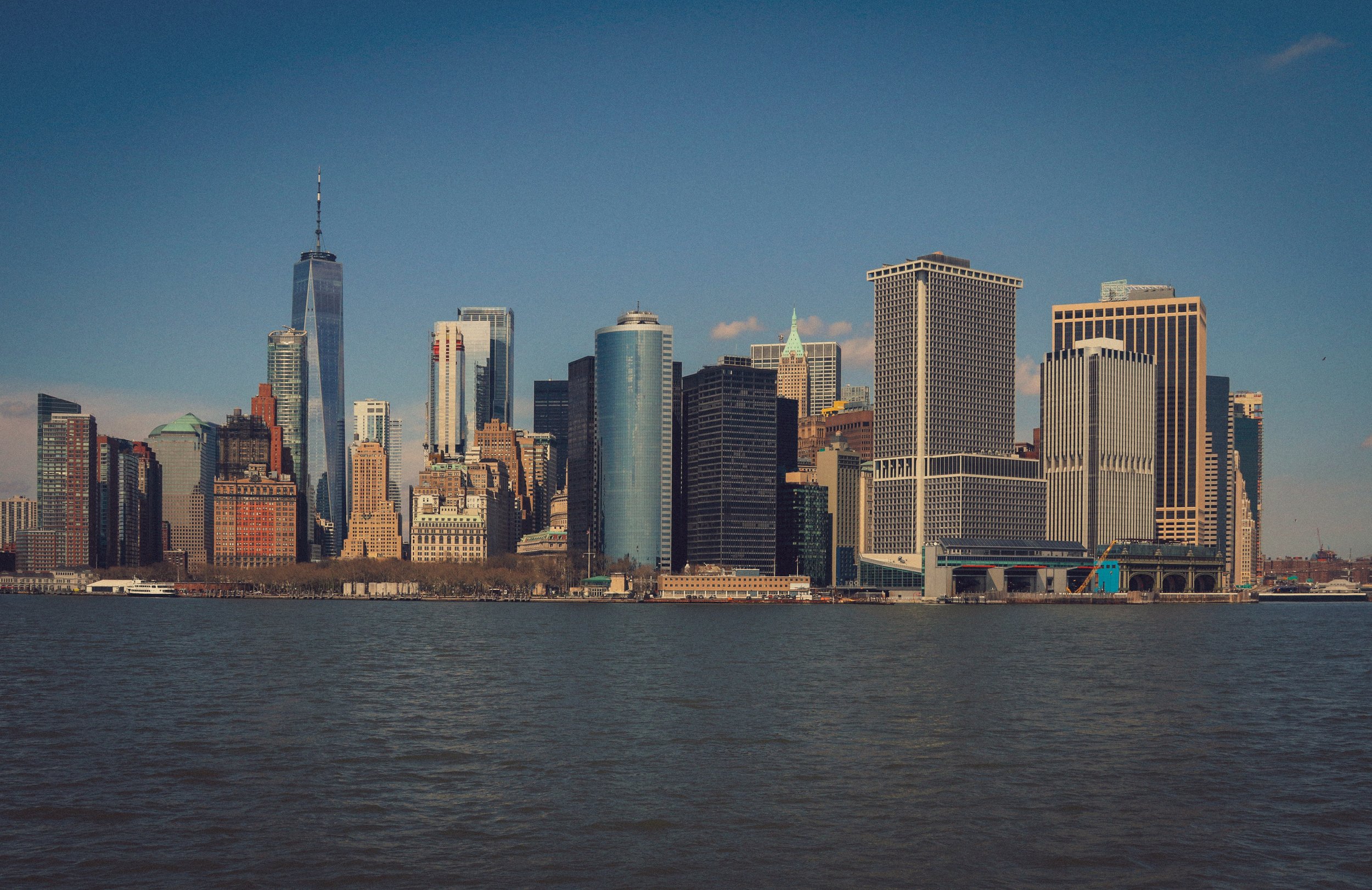 Skyline of Lower Manhattan with skyscrapers and waterfront.