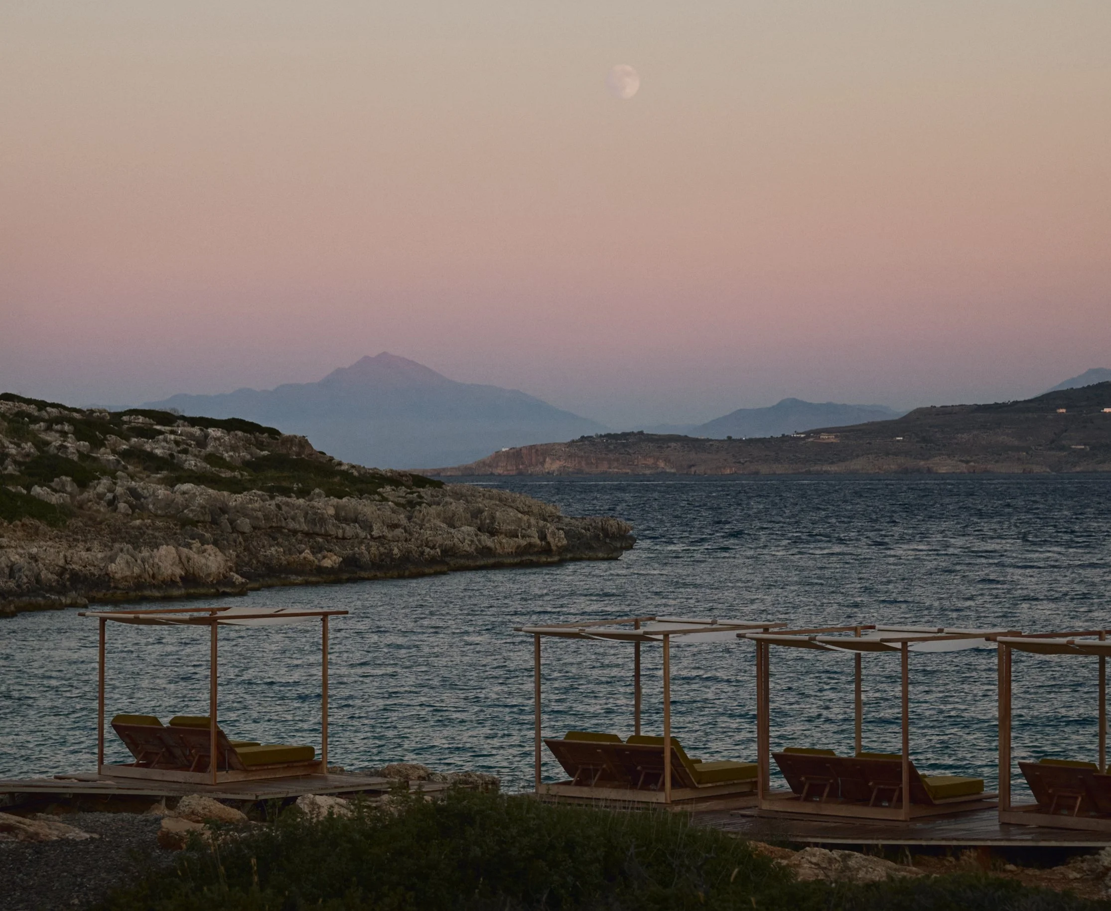 JW Marriott Crete, Greece: resort terraces and the bay at dusk