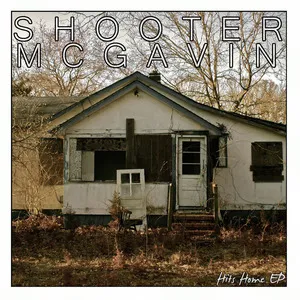 A neglected white house with broken windows and overgrown yard, titled 'Hits Home EP' by Shooter McGavin. Album art.