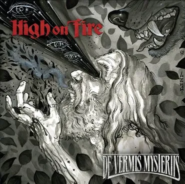 An illustrated album cover for High on Fire titled "De Vermis Mysteriis," featuring a bearded man with long hair and a beard, screaming with an eye on his forehead, as a black beam or liquid is emitted from his eye, with a snarling wolf head nearby. 