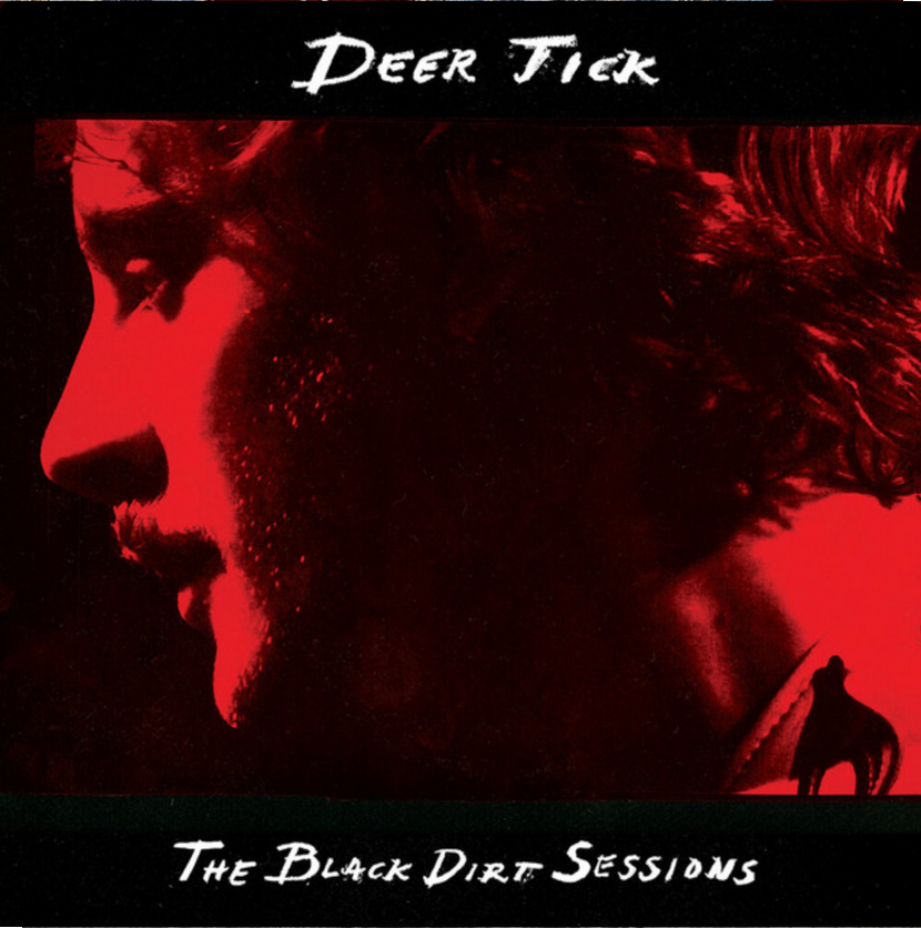 Album cover featuring a red-tinted profile of a man with long hair and facial hair, with a small silhouette of a person on horseback in the bottom right corner, and the text 'Deer Tick' at the top and 'The Black Dirt Sessions' at the bottom.