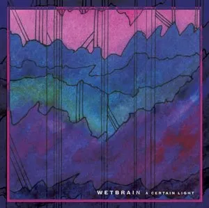 Abstract colorful artwork with shades of pink, blue, and purple, featuring a mountain silhouette and vertical lines, with the text "Wetbrain A Certain Light" at the bottom. Album cover.