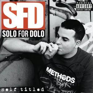 Cover of an album Self-titled by Solo for Dolo, featuring a black and white photo of a man with dark hair, wearing a black shirt with white text, holding a cigarette in his right hand, with a garage or industrial background.