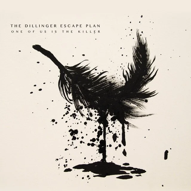 Album cover art featuring a black ink splash illustration resembling a bird, with scattered ink splatters on a white background. Text reads 'The Dillinger Escape Plan One of Us is the Killer'.