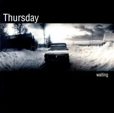 A snow-covered street with a parked car on the street, cloudy sky, and trees in the background. Album art for "Waiting" by the band Thursday.