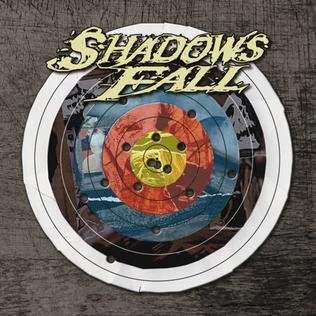 Target with the Shadows Fall logo and a yellow smiley face in the center. Album artwork for 'Seeking the Way.'
