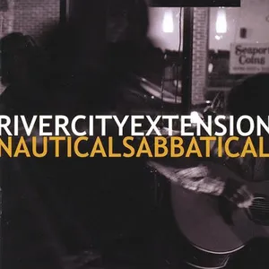 A person playing guitar in a dimly lit room or stage with text overlay reading 'River City Extension' and 'Nautical Sabbatical'. Album art.