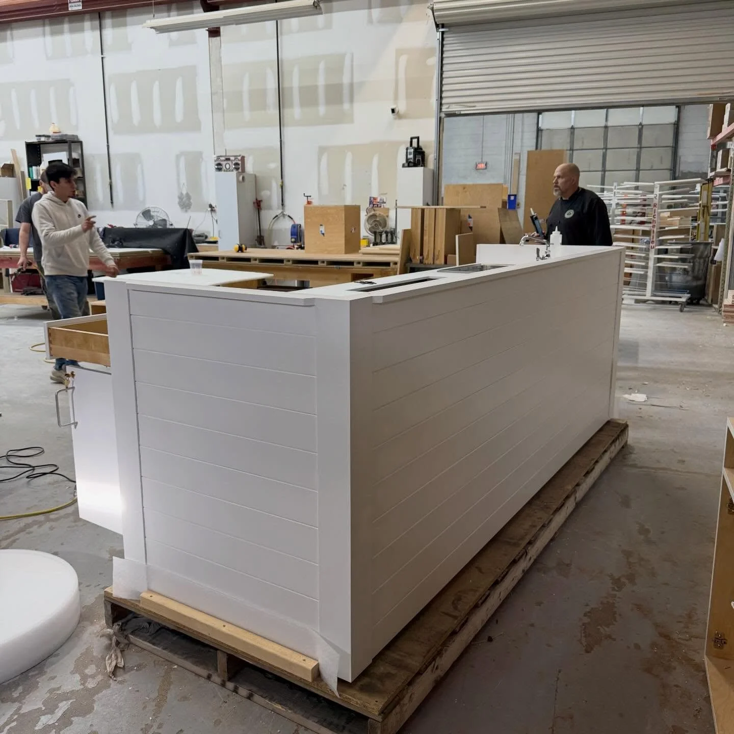 Another trip to Mackinac Island today! This time with a commercial bar built for exterior use. Fit with custom Corian countertops and assembled with precision - ready for service! 

#customwoodworking #millwork #woodworking #custommillwork #custombar