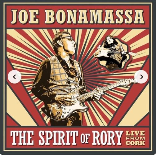 Album cover for Joe Bonamassa's 'The Spirit of Rory,' featuring a large image of Joe Bonamassa playing guitar with another smaller image of him playing guitar in the corner. The background has a red and cream sunburst pattern with bold text.