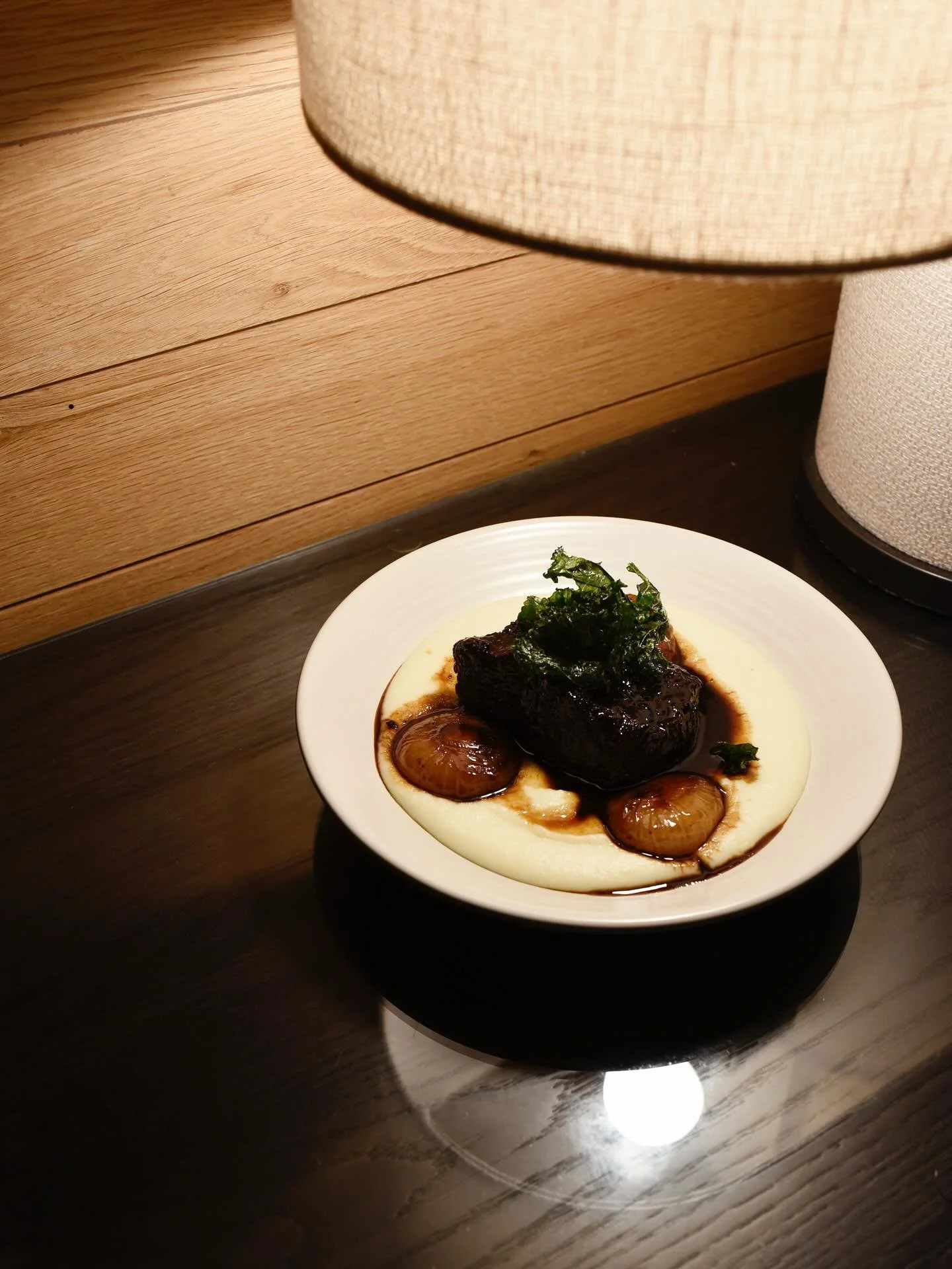 A dish you will definitely want to have more than once ~ Braised Boneless Shortrib. Crispy kale, sweet &amp; sour onions, smoked buttermilk potato puree &amp; braising jus. Come experience this dish from our dinner menu from 5-9 tonight!

#trussresta