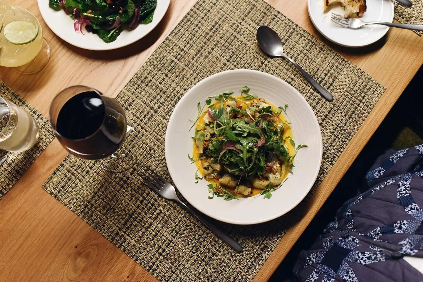 There&rsquo;s something on our menu for everyone&mdash;and this dish is proof. A seasonal quinoa cake with apple + butternut, silky spiced butternut pur&eacute;e, roasted cauliflower, pickled onion, and fresh arugula. Plant-based, vibrant, and made t