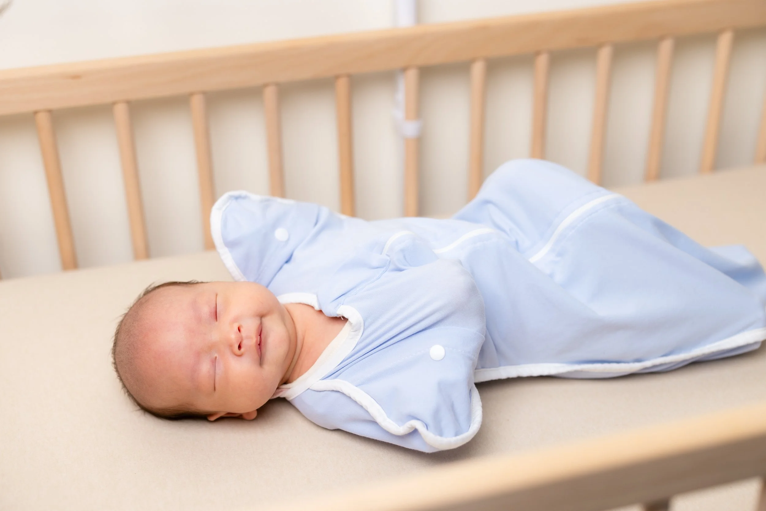infant sleep consultant helping baby settle at bedtime