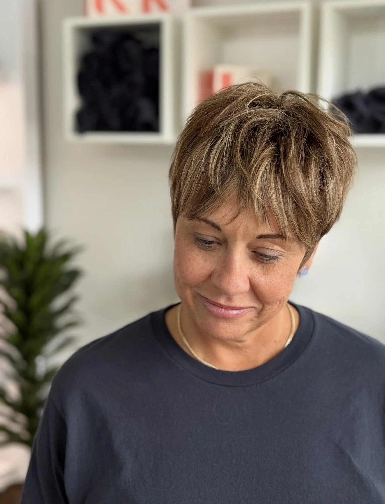 Short textured precision haircut customized for the client's head shape. 