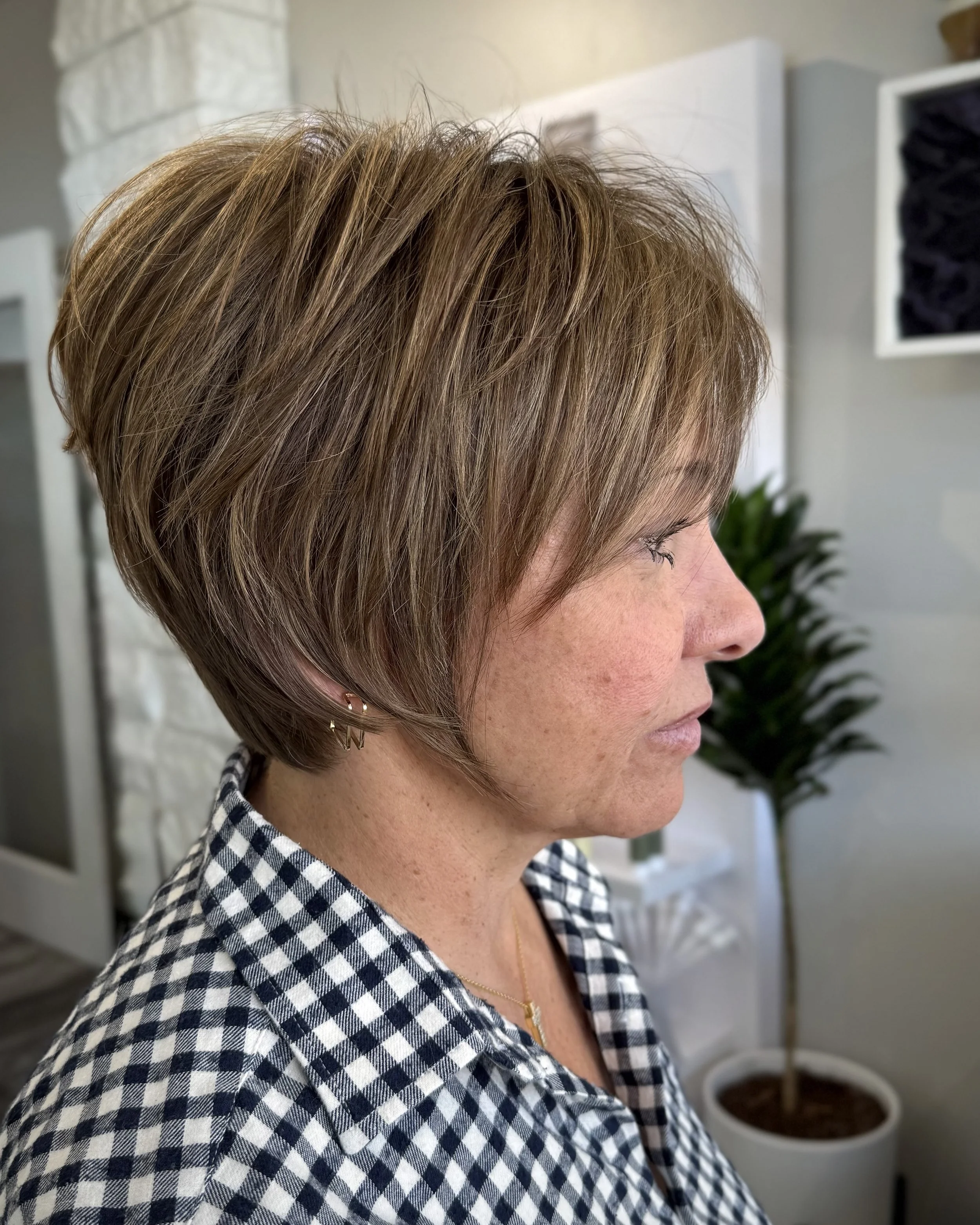 Precision short haircut customized for the client's head shape and natural movement. 