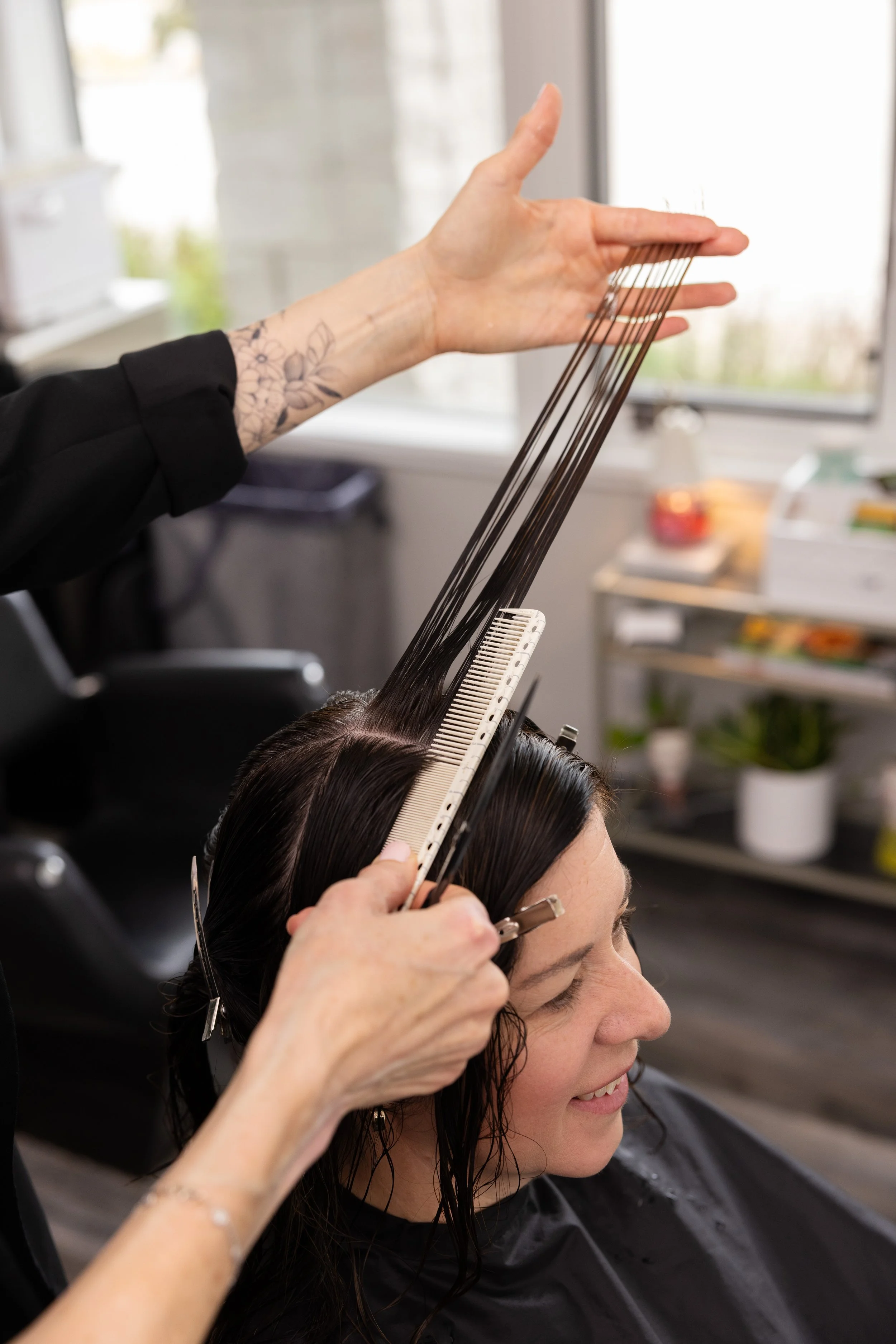 Custom precision haircut designed for a client's natural head shape.