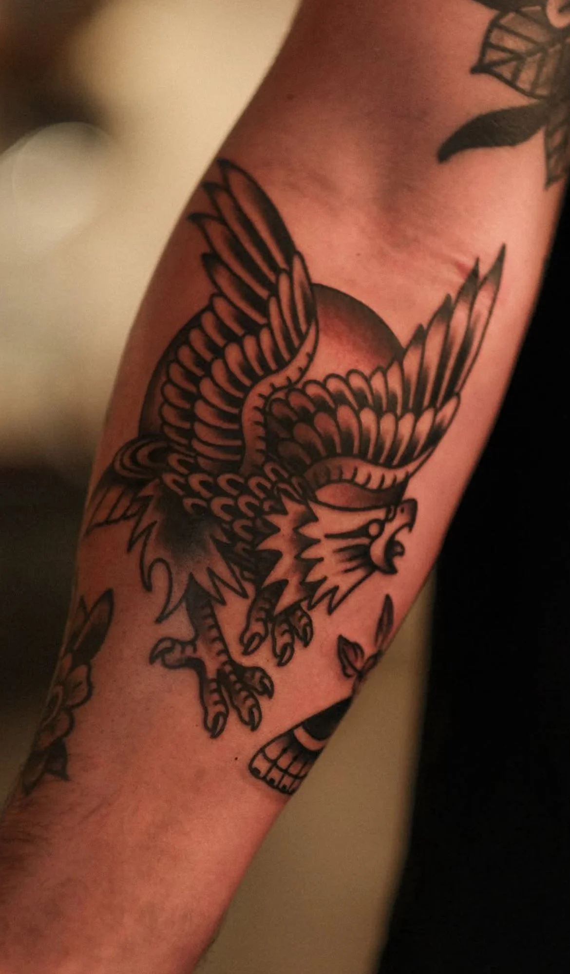 Traditional eagle tattoo with bold linework done in San Diego