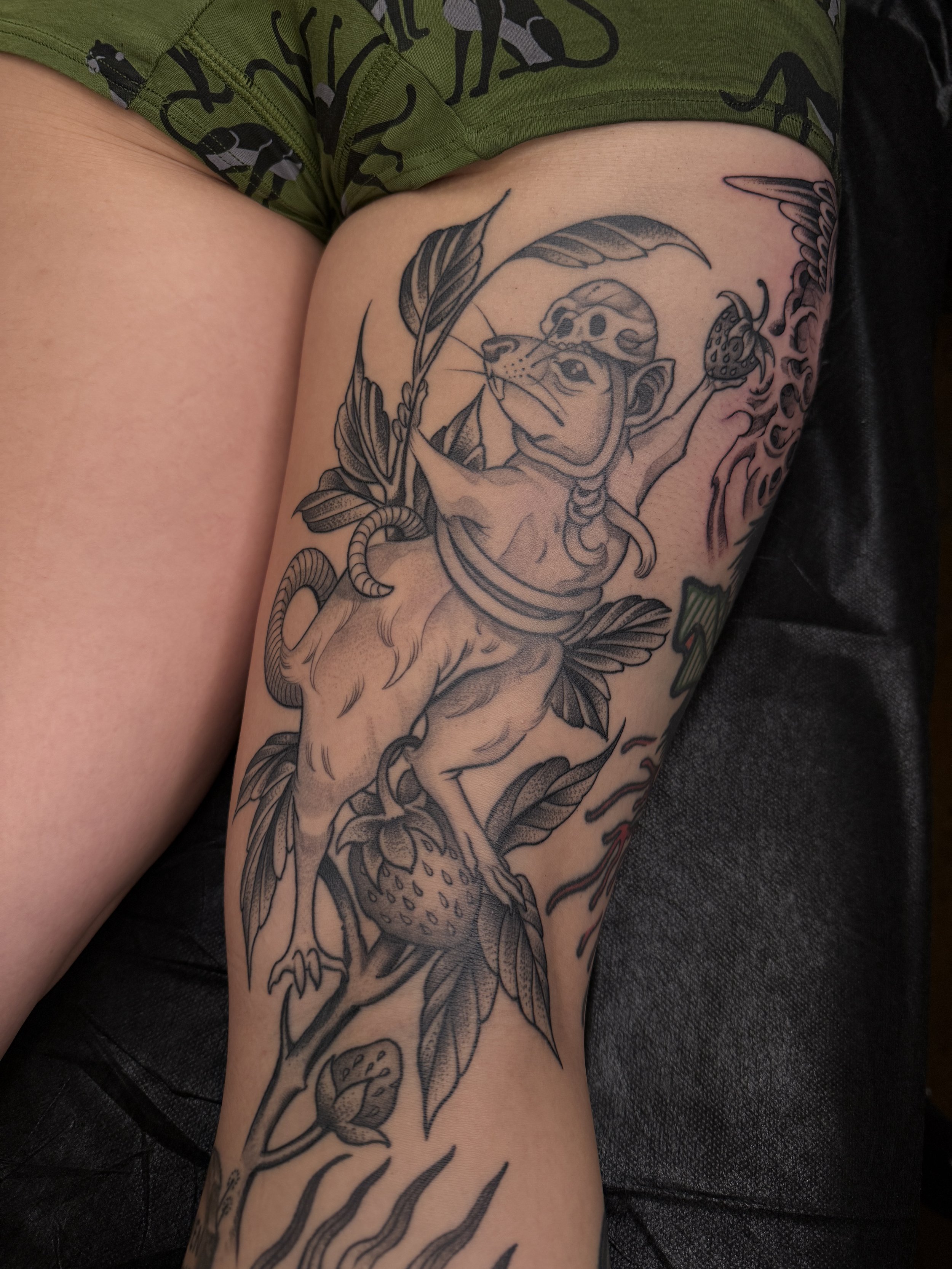 Illustrative rat tattoo with expressive linework done in San Diego