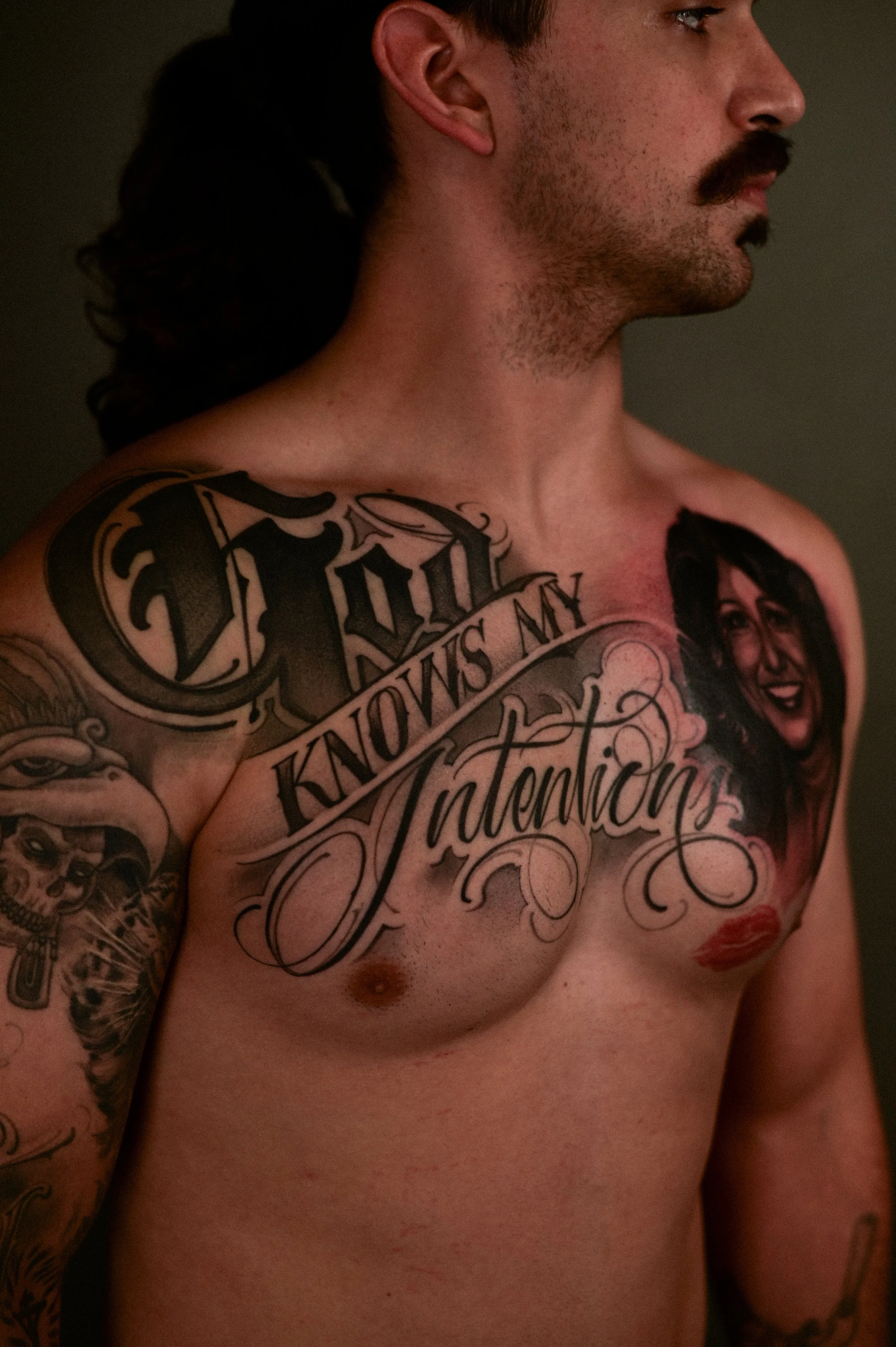 black and grey lettering and portrait tattoo created in South Park San Diego