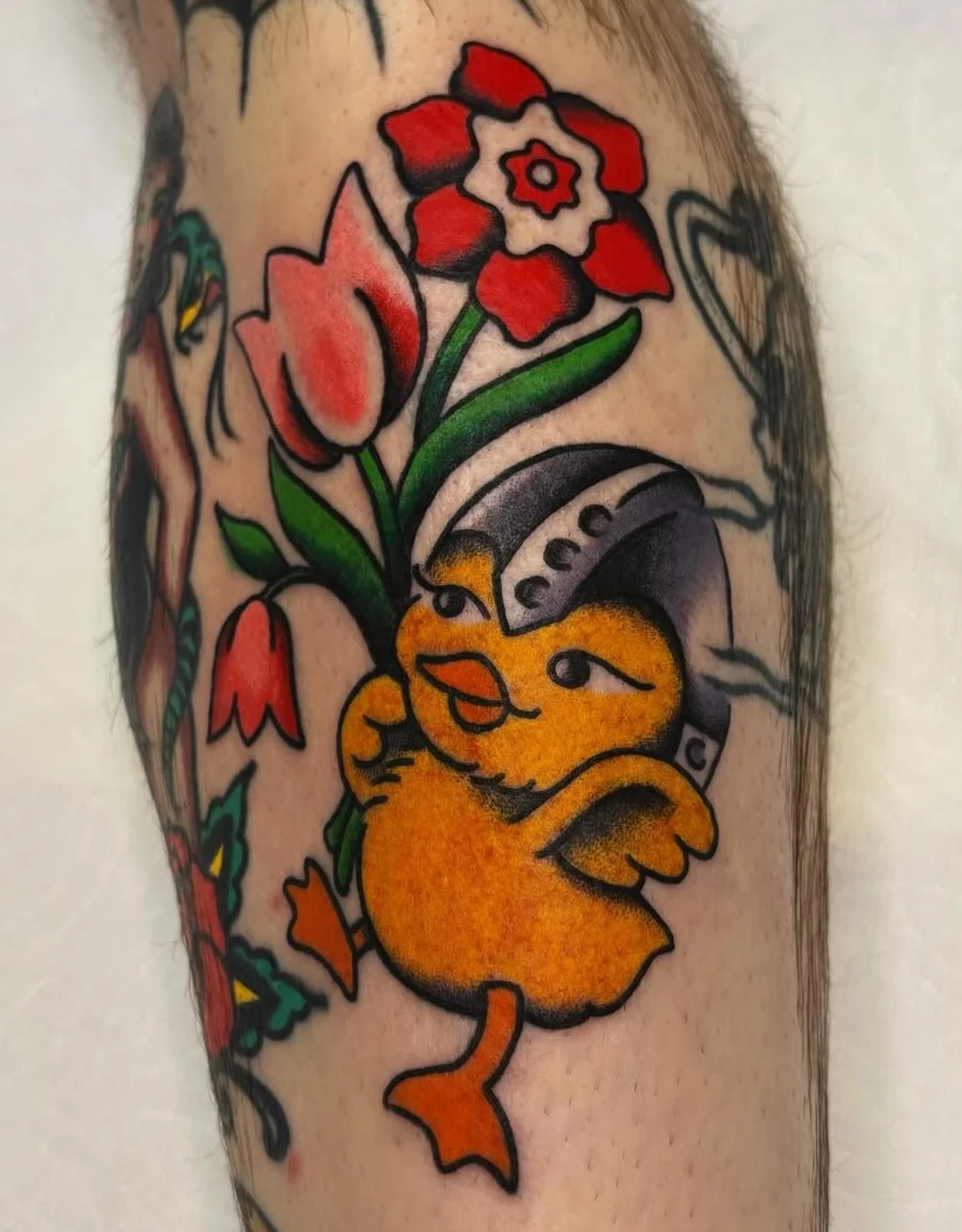 Traditional duck tattoo with bold linework done in San Diego