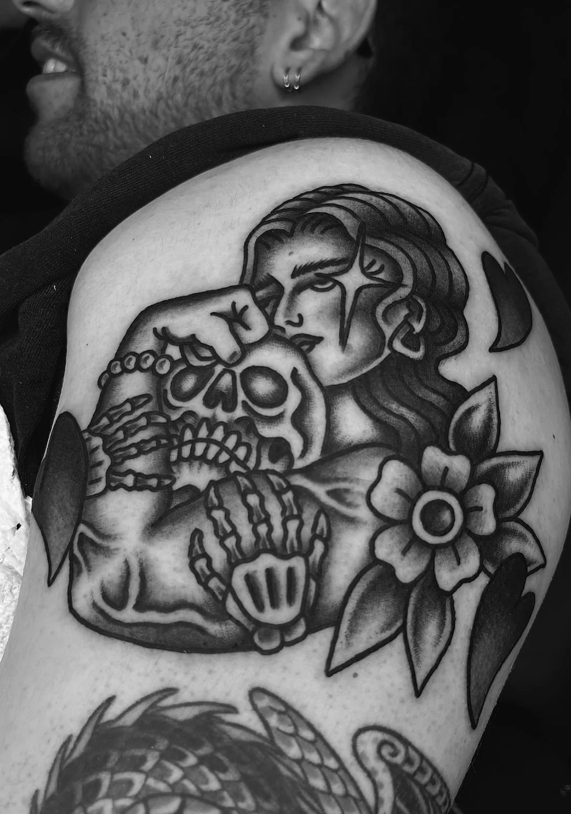 Traditional muscle mommy tattoo with bold linework done in San Diego