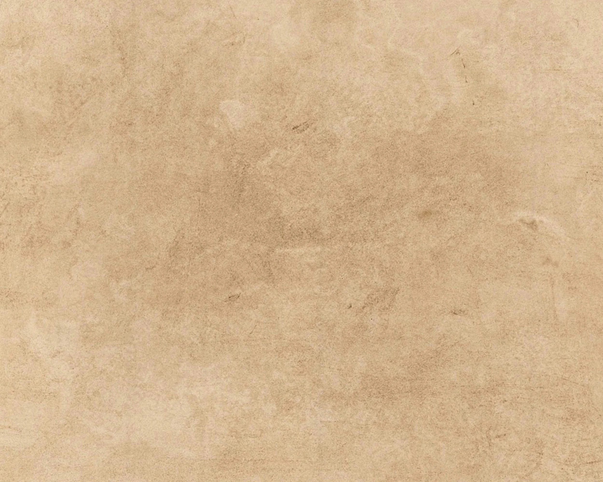 Plain brown textured paper or cardboard surface.