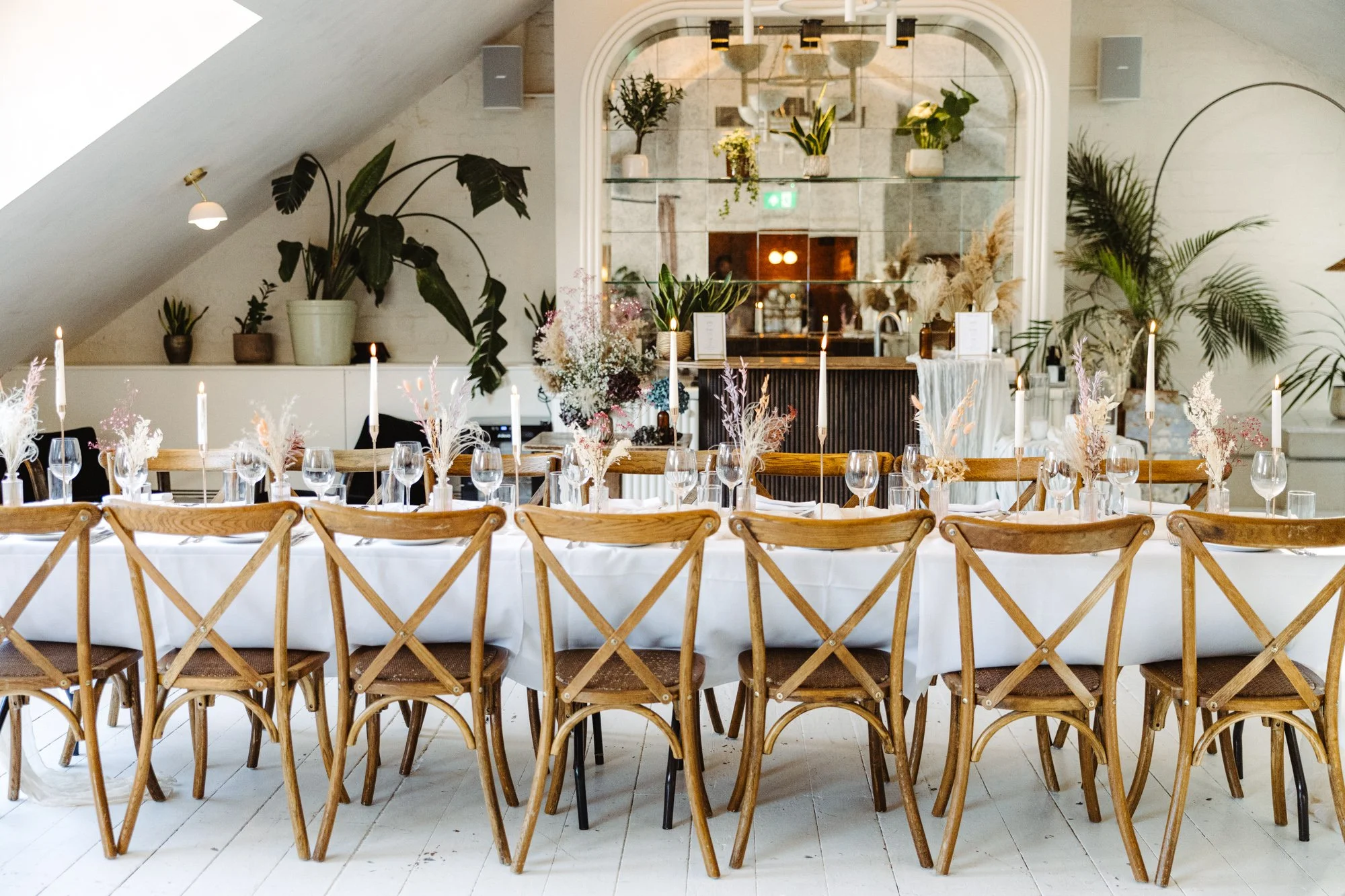 A light-filled private dining room in London featuring large windows, natural light, & its own bar. Ideal for Christmas parties, birthdays, corporate functions, weddings, wakes, baby showers, and all private events : 14–60 guests seated/ 100 standing