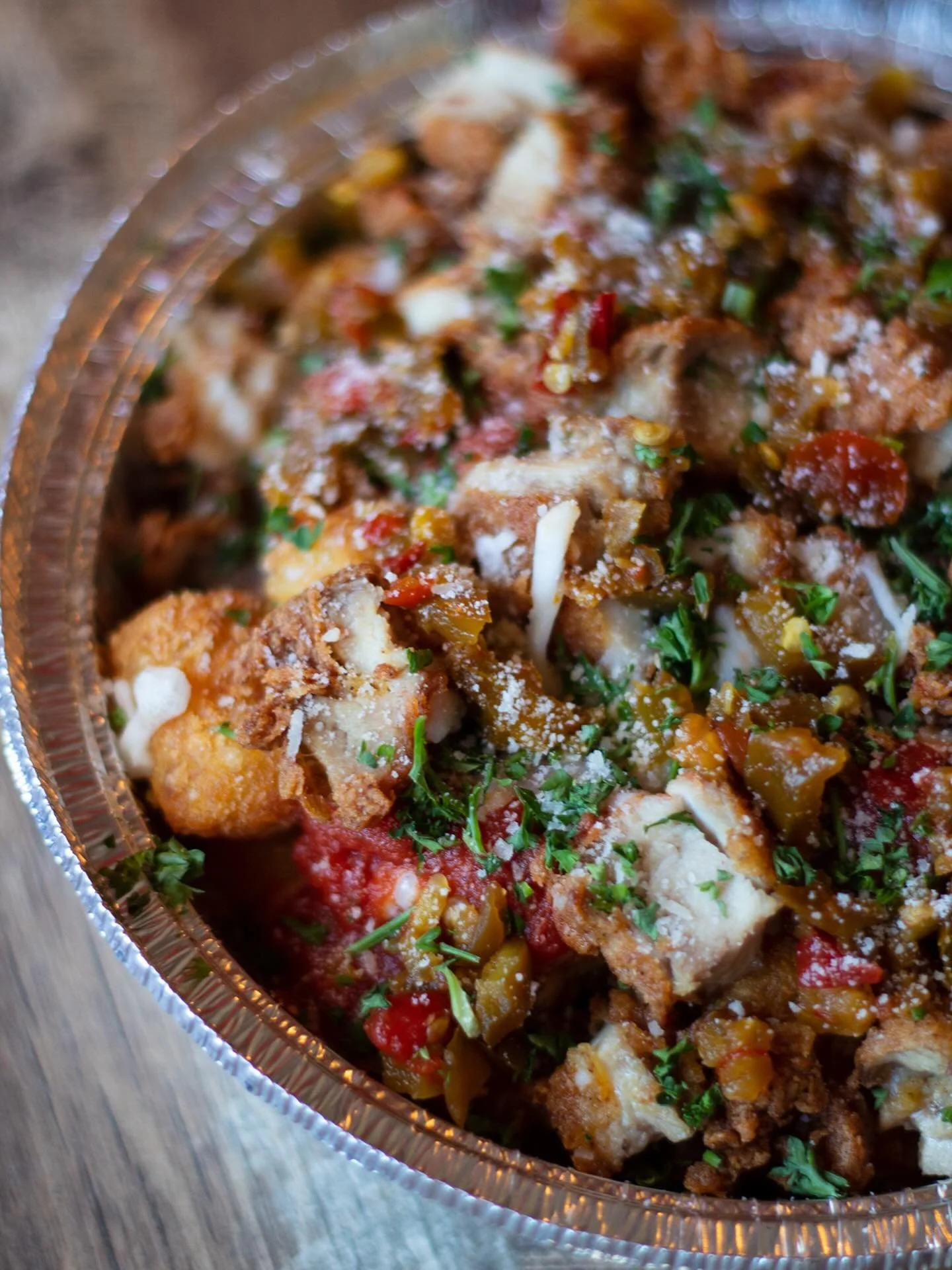 We took a chicken parm sub and absolutely wrecked it onto a pile of tots.

Marinara. Melty mozz &amp; provolone. Fried chicken. Parm. Pickled cherry peppers.

The Chicken Parm Hero Loaded Tots. No notes.