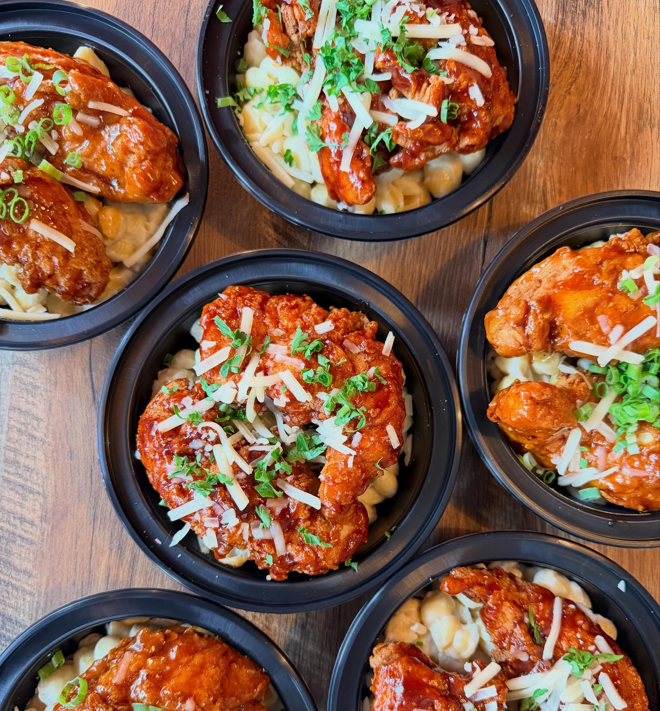 NOW TESTING in the grab-and-go case! A hearty meal for big appetites, our &ldquo;Tendie Mac Bowls&rdquo; start with 8oz of creamy Mac and cheese, topped with two of our signature Super Tendies, then bathed in either Chipotle Cherry Coke BBQ or ZomBee