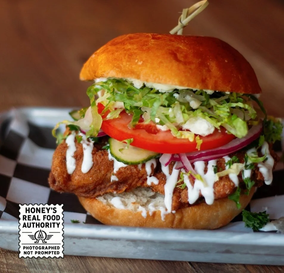 THE ACROPOLIS NOW

A fried chicken sandwich with gyro energy.
White gyro sauce, quick-pickled cucumbers and red onions, tomato, romaine, feta, garlic aioli, and Honey&rsquo;s Wing Dust on our signature fried chicken thigh.

Available now, for a limit