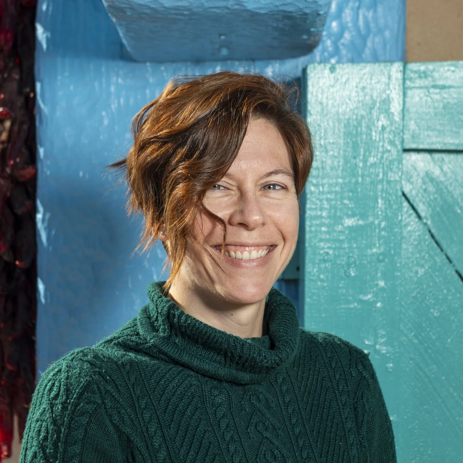 Young woman smiling outdoors