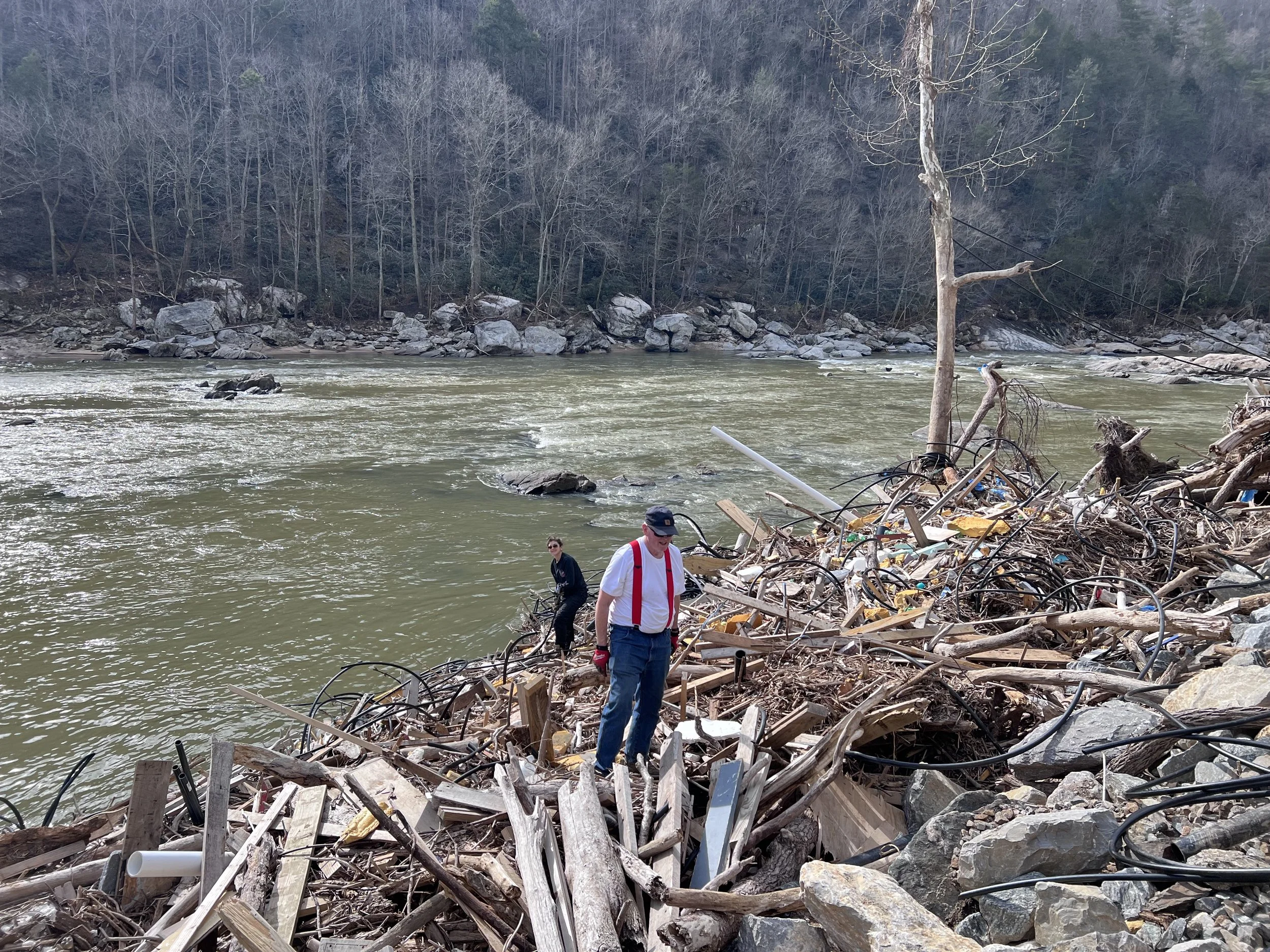 FBC homeowners clean up PVC from French Broad River