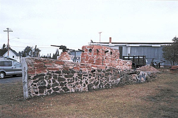Photo taken by Dave Patrykus, in the little village of Kearsage, MI. Could this be a stone carving of the Battleship USS KEARSARGE ?