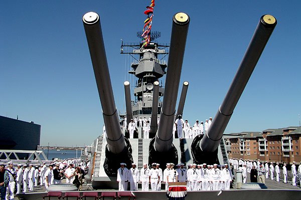 Sailors from the aircraft carrier Theodore Roosevelt (CVN-71) manning the rails.