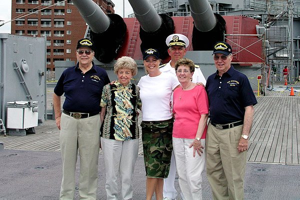 Dick Hamann, Claire, Karri Turner, RADM Architzel, Lil and Dom Mentaunder the 16" guns.